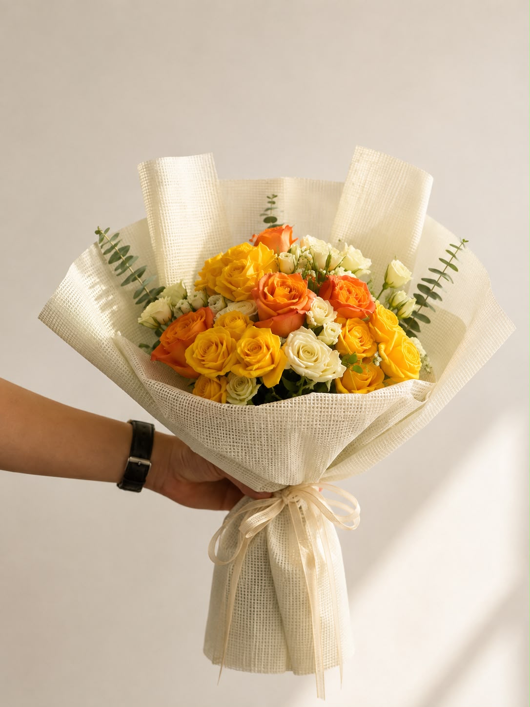 Summer: orange and white rose in a bouquet