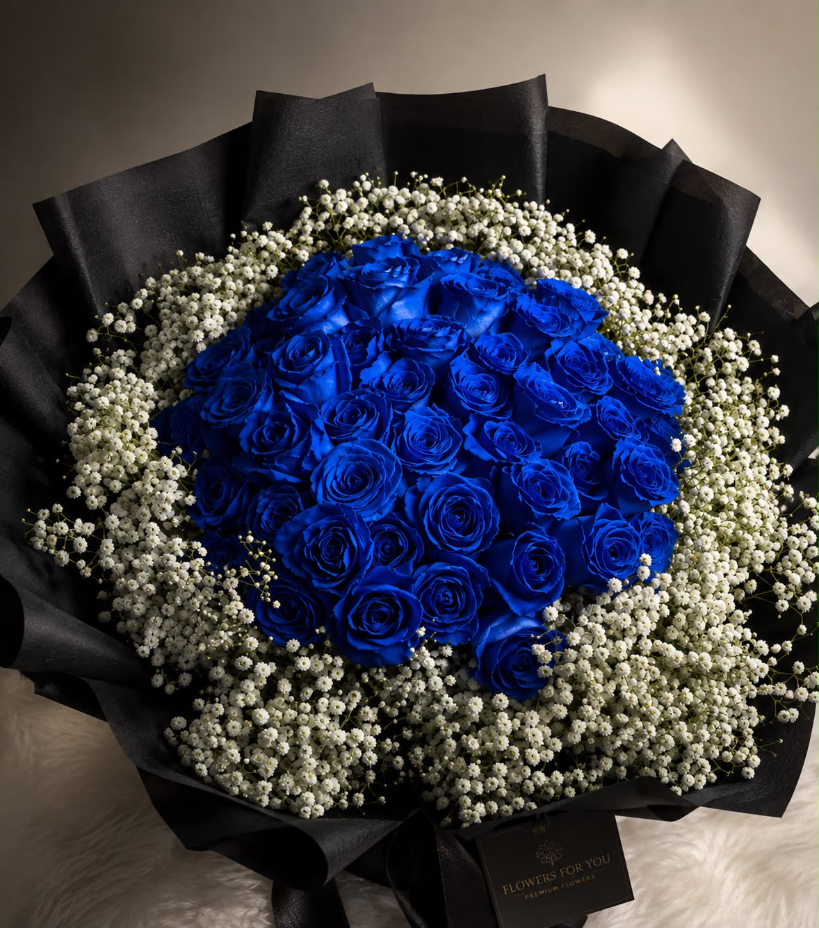 Blue Symphony: blue rose, gypsophila in a bouquet