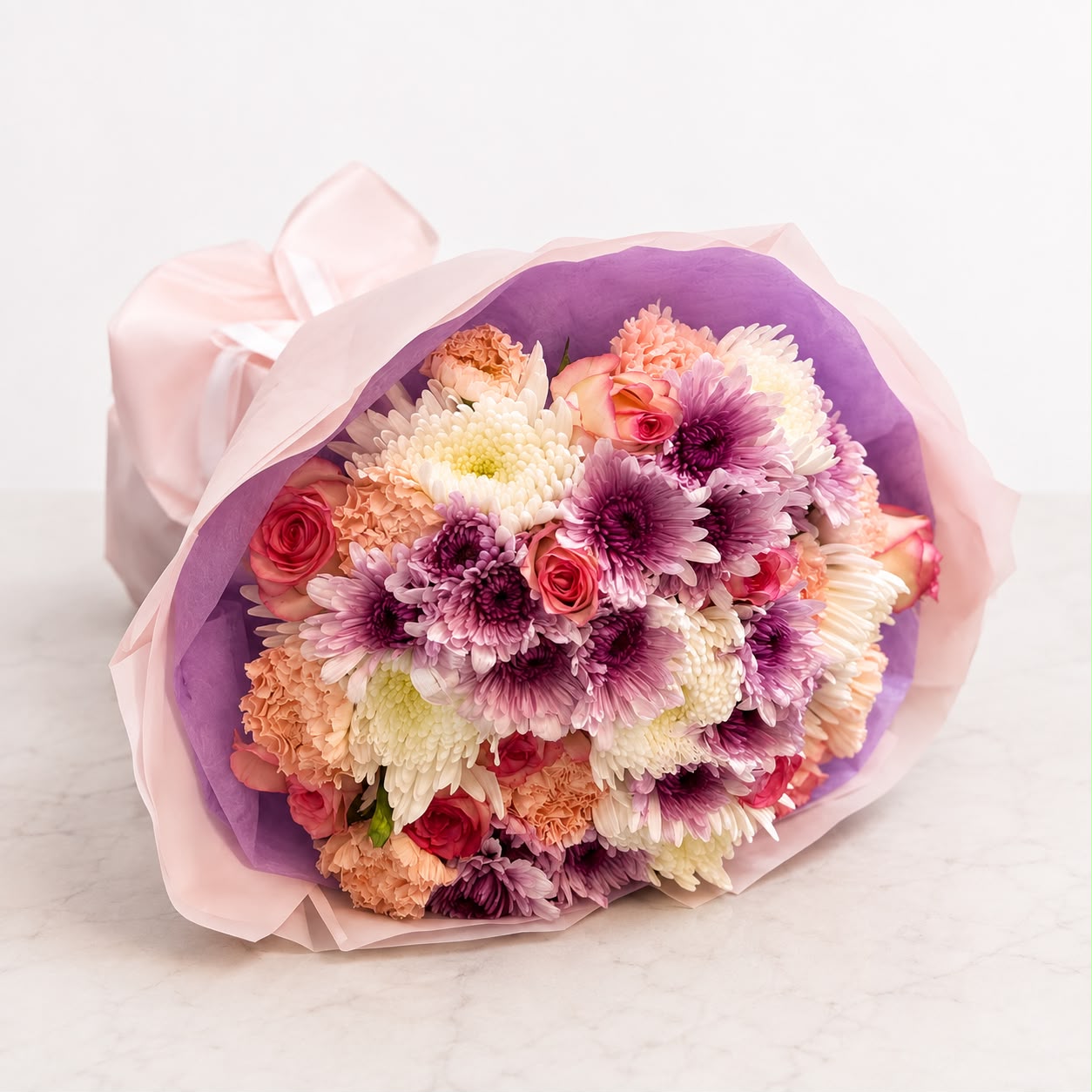 Princess Jasmine: pink chrysanthemum, carnation, rose in a bouquet