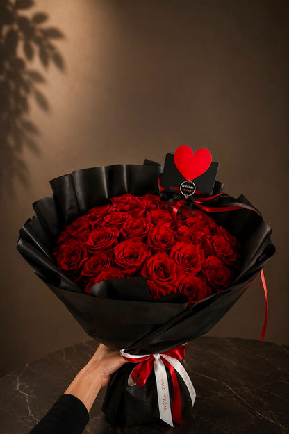 Love Devotion: red rose in a bouquet