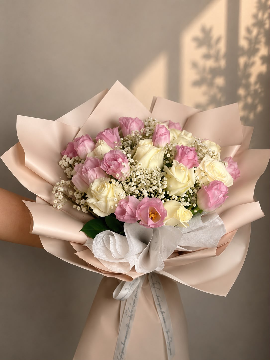 Blush Petal Harmony: pink tulip, gypsophila, rose in a bouquet
