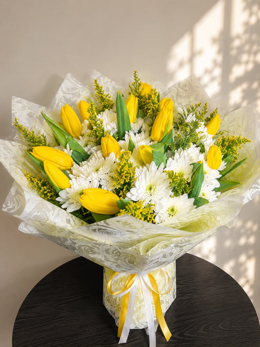 Golden Morning Delight: yellow tulip, chrysanthemum, solidago in a bouquet
