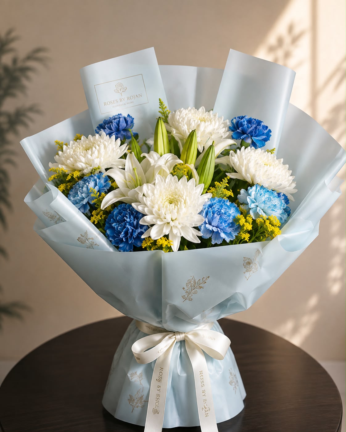 Sky Whisper Bloom: blue and white solidago, carnation, chrysanthemum in a bouquet